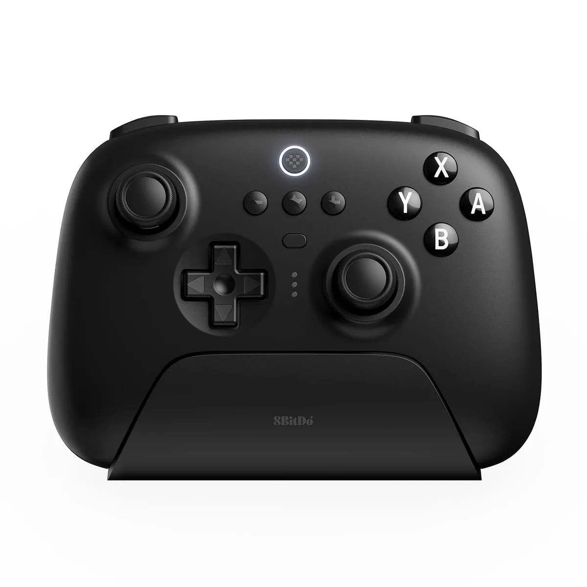 Black 8BitDo Ultimate Bluetooth controller seated on its charging dock