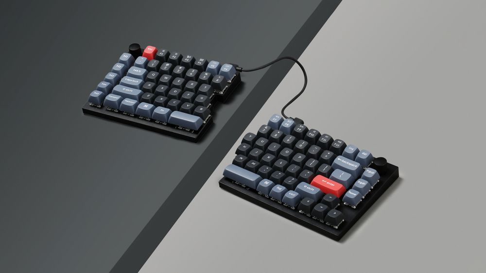 Keychron Q11 split mechanical keyboard, both halves on a desk